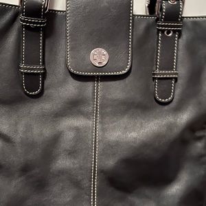 Leonello Borghi black leather pocketbook with white piping by Tempo.